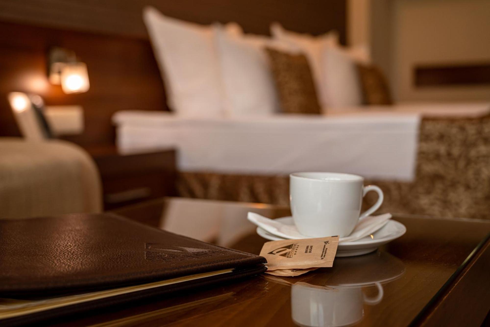 Spa Hotel Persenk Devin Exterior foto A coffee cup in a hotel room